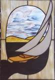 Stained glass sailboat with sunlight streaming through